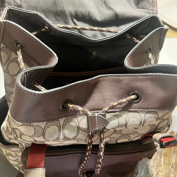 coach backpack with wallet West Baseball Print Deep Blue Multi CAX47 Fabric Lininghandle With 2 14 Drop Outside Zip Pocket Adjustable Shoulder Straps10 34 (L) X 12 12 (H) X 4 34 (W) Coach Cassidy Backpack Art Deco